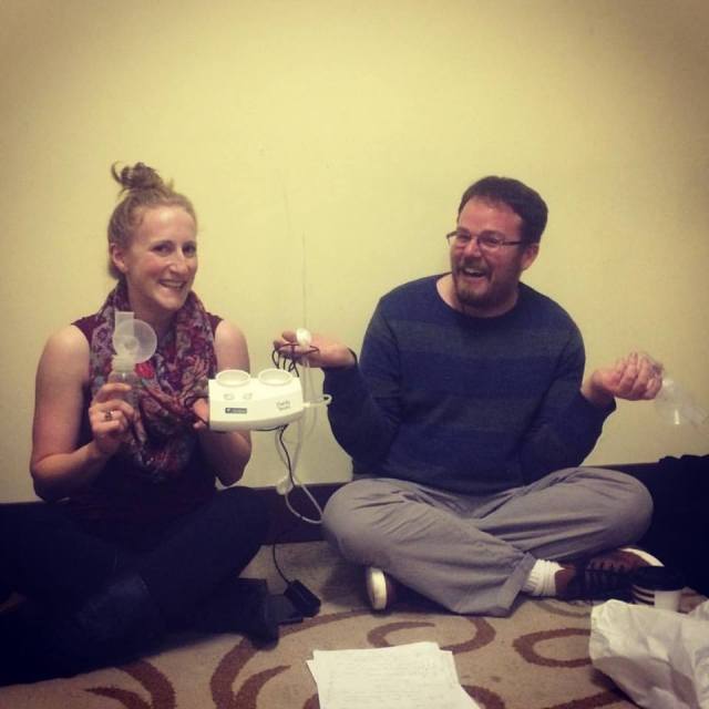 Caitlin Evenson and director Stuart Bousel pose with the Breast Pump That Never Goes Out. 